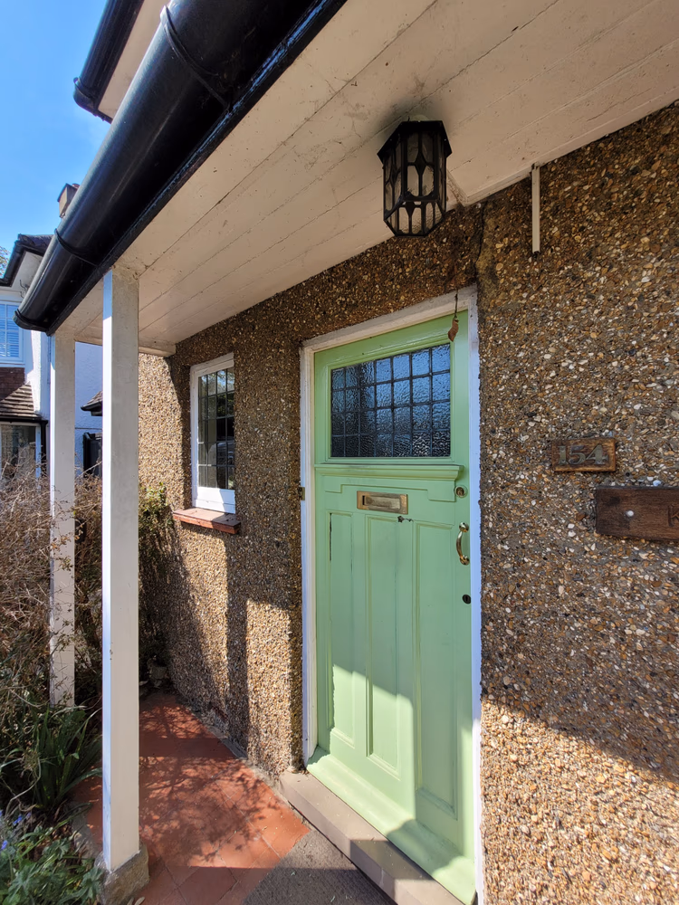 Front Door and Porch Restoration in Teal Facade, photo 22 of 24