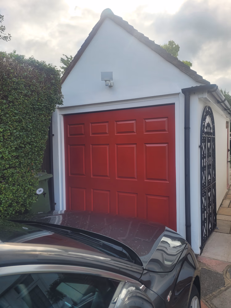 Fibreglass garage door sprayed to match hand painted front door in Epsom